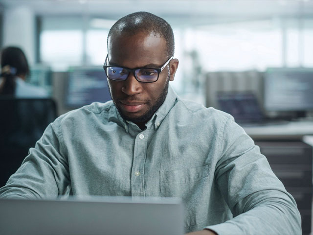 Graduate student using computer